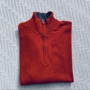 The North Face orange quarter zip pullover